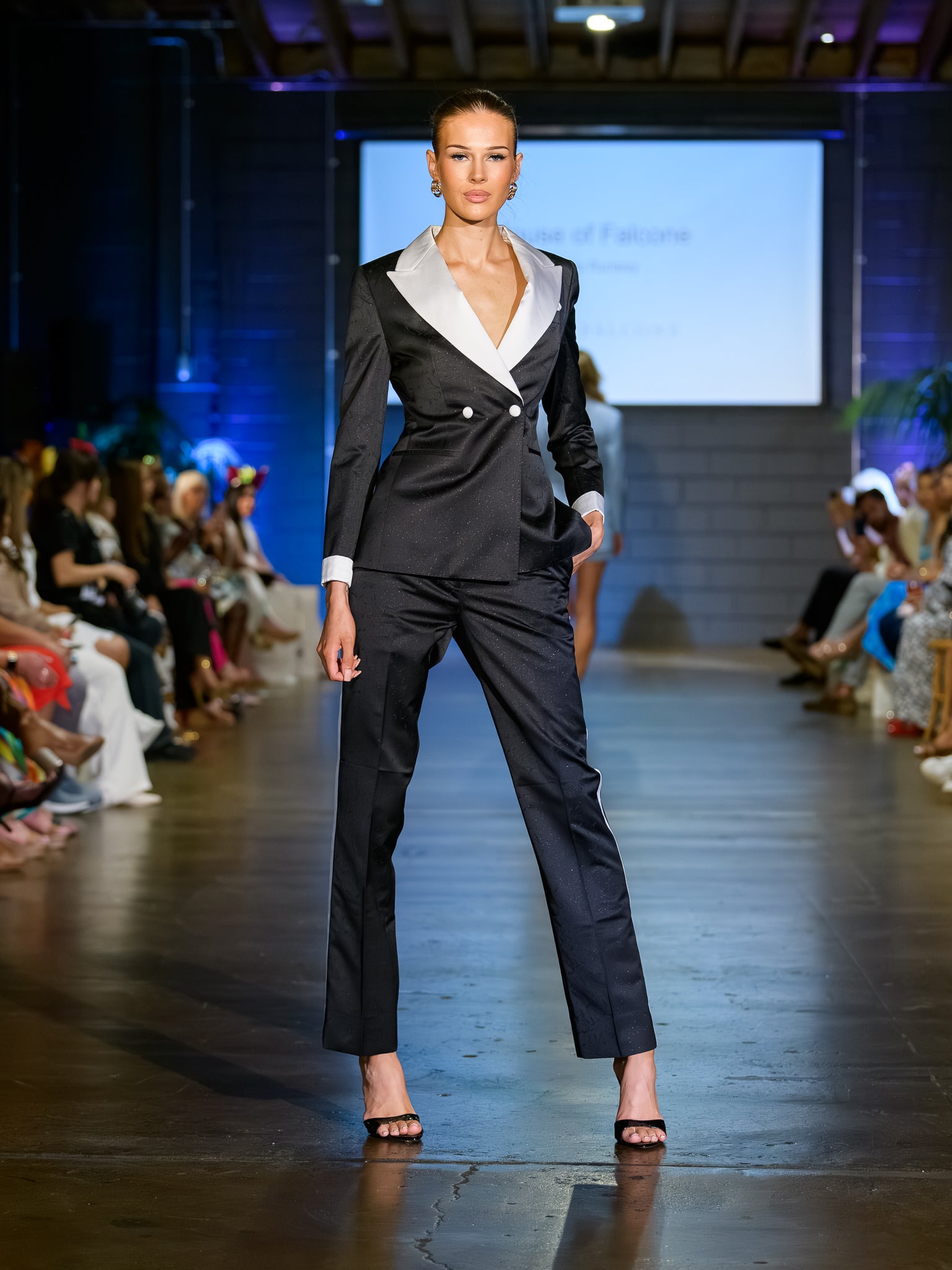 Woman in bespoke black satin-lapel tuxedo, House of Falcone Brisbane
