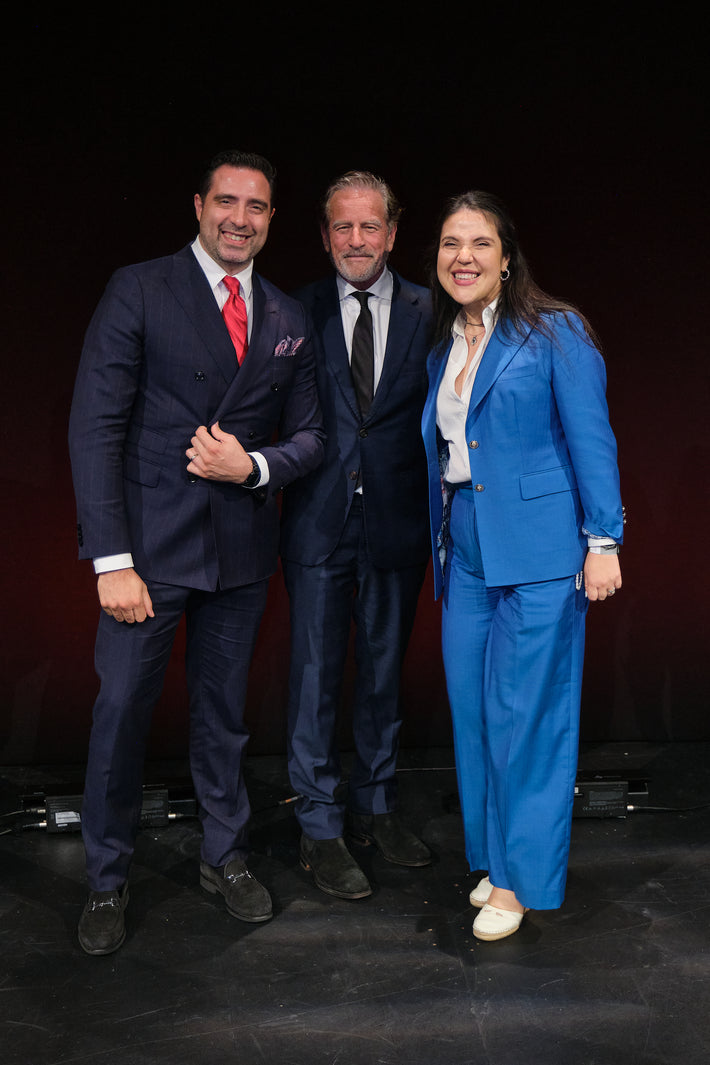 Mark Bouris with House of Falcone team on stage, Brisbane bespoke tailoring VIP event